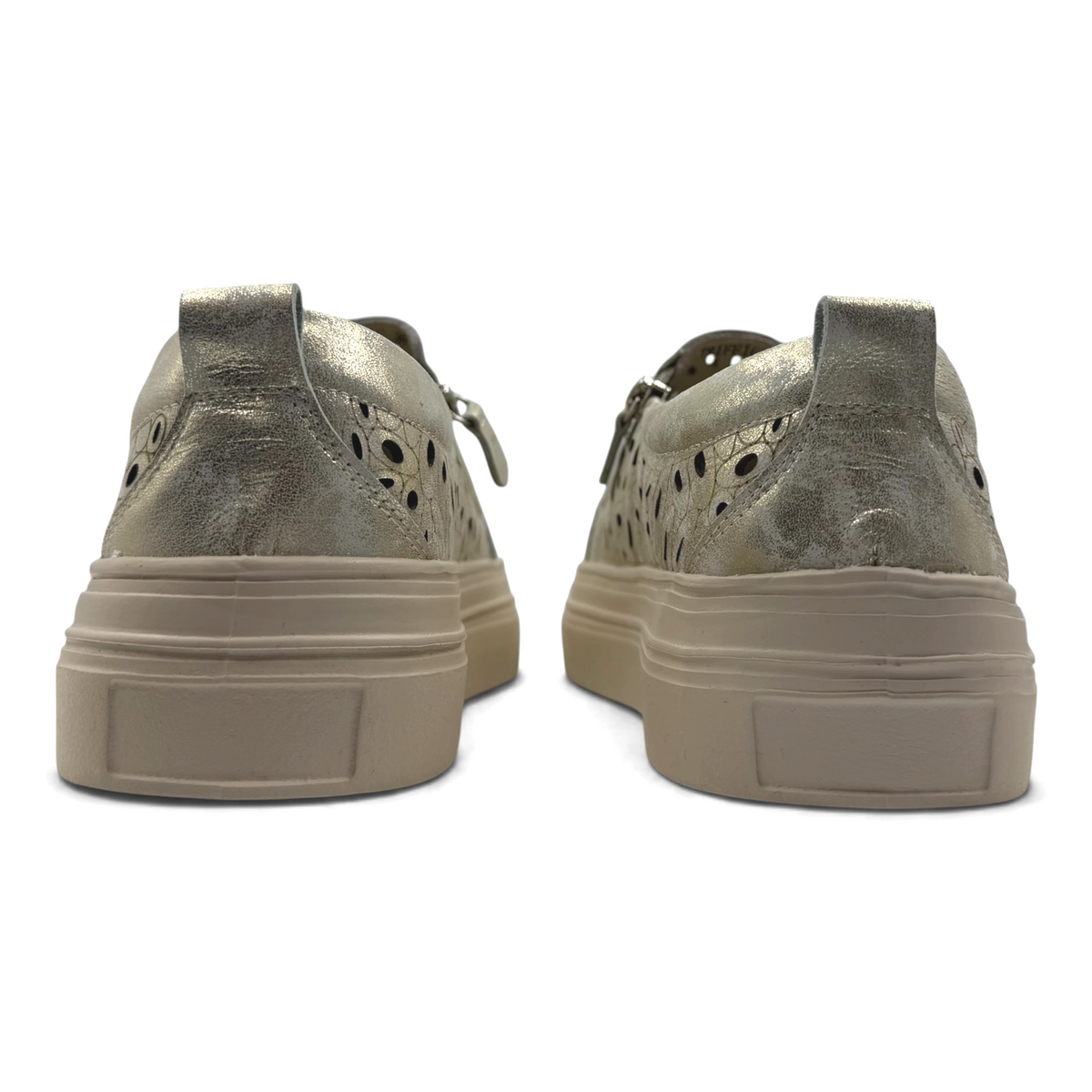 The Shoe Shop Triffic leather sneakers in metallic gold with laser-cut detailing and a beige rubber platform sole.