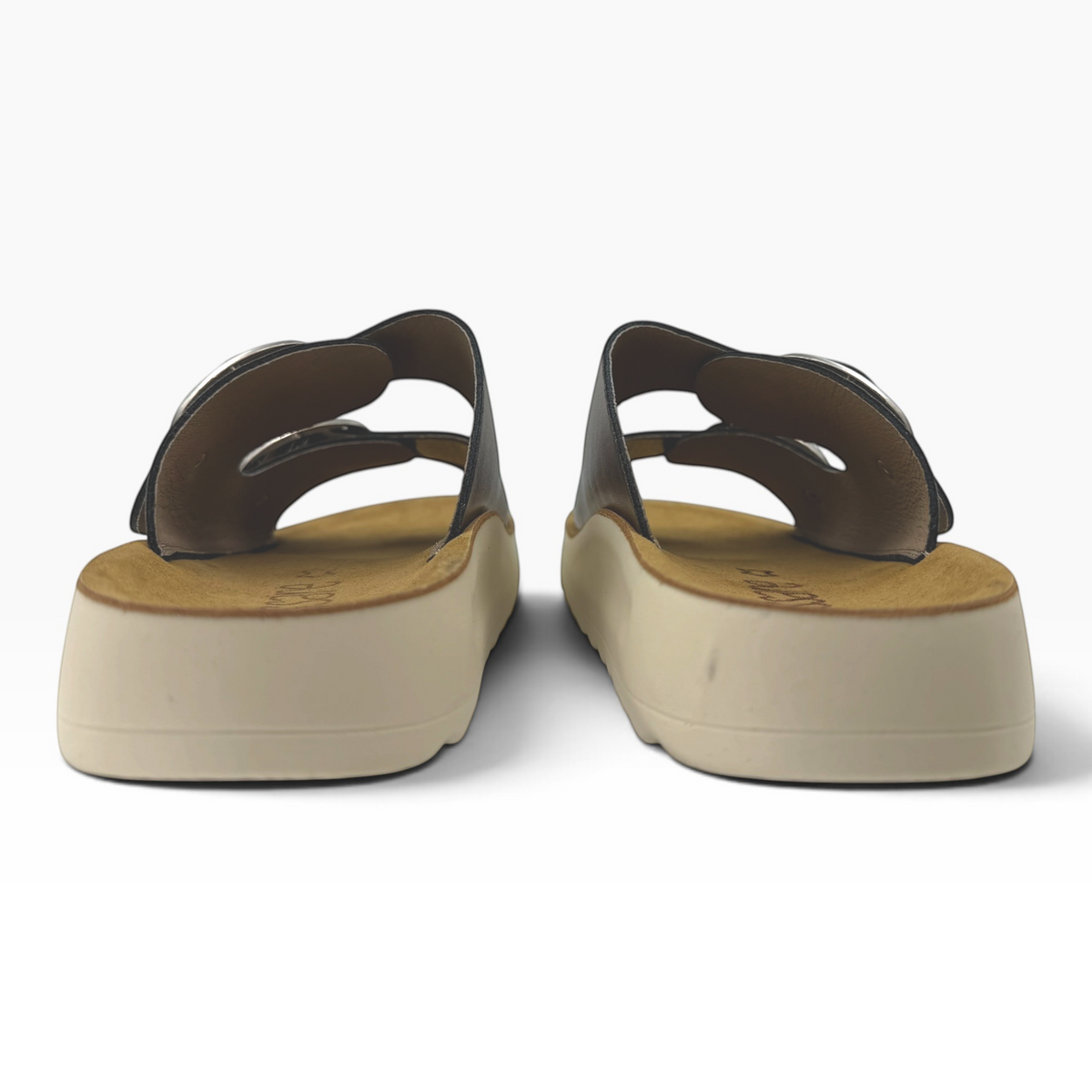 The Shoe Shop Trippie platform sandals in black with a beige sole, shown from a rear angle.