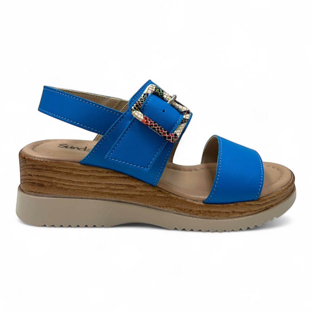 The Shoe Shop Turin blue wedge sandal with a wood-look platform sole and an adjustable snake-print buckle strap.