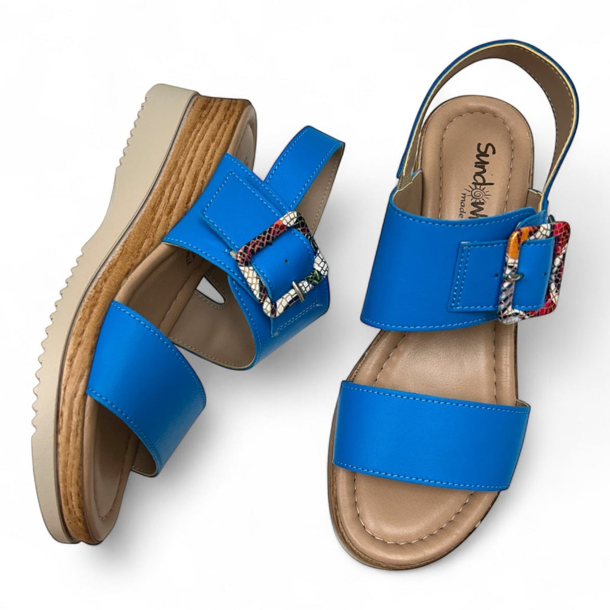 The Shoe Shop Turin blue wedge sandals with wood-look soles and a colourful patterned buckle strap