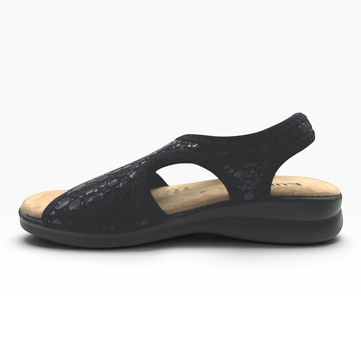 The Shoe Shop Tuscany black vegan sandal with a low wedge sole and stretchy patterned upper for a comfortable fit.