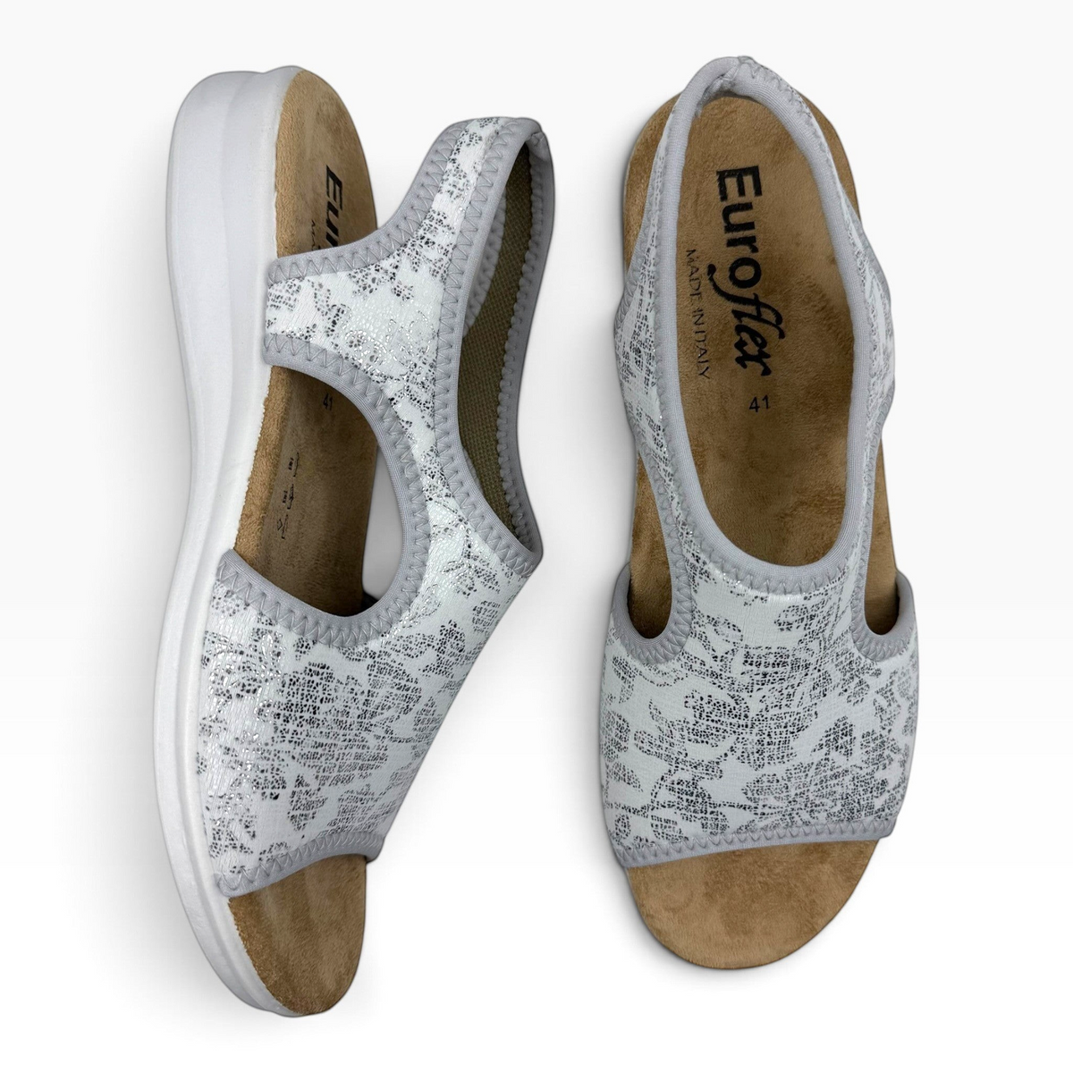 The Shoe Shop Tuscany vegan sandals in silver with a low wedge sole and flexible, cushioned fit for summer comfort.