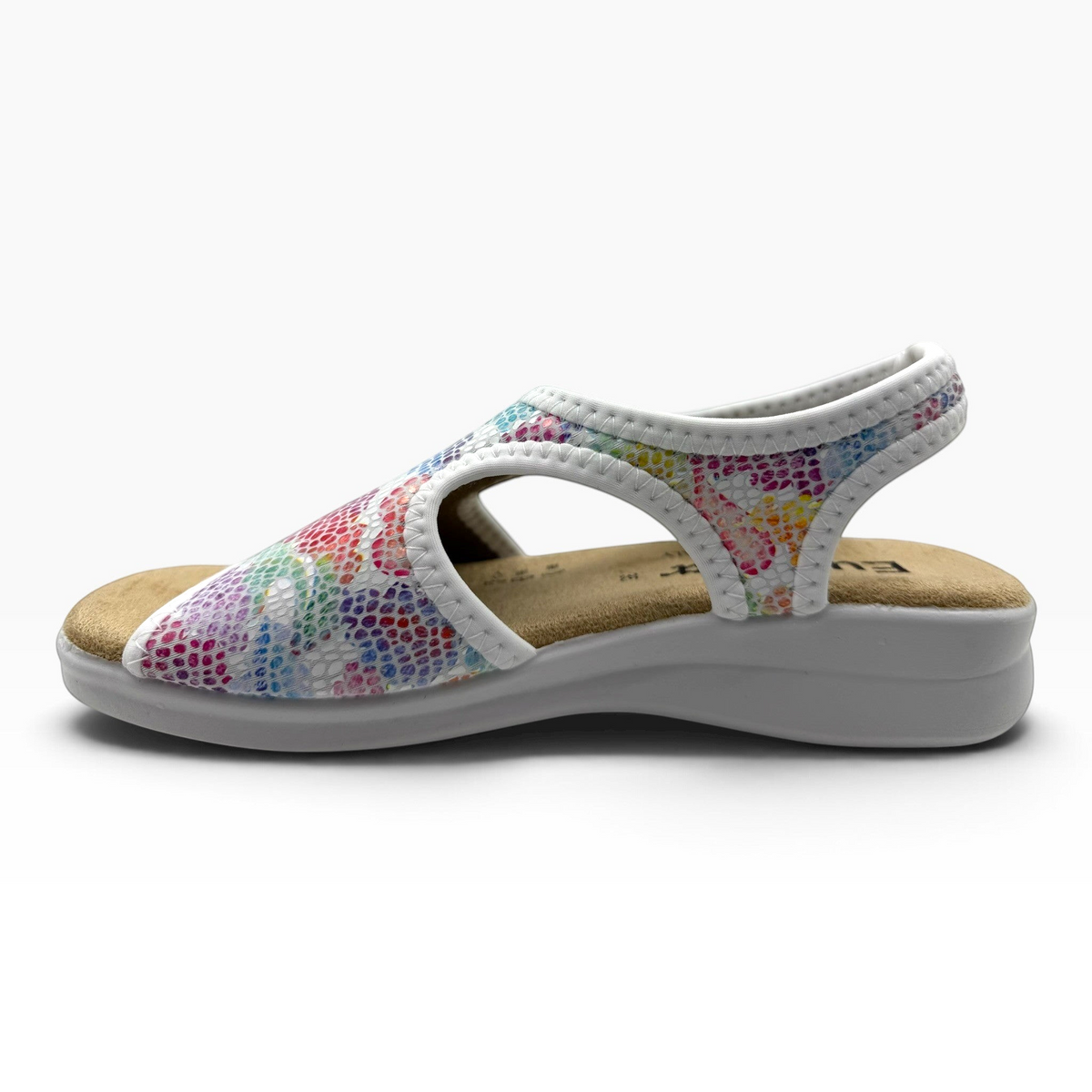 The Shoe Shop Tuscany vegan sandal with a multi-colored snakeskin pattern, elastic upper, and low cushioned wedge sole.
