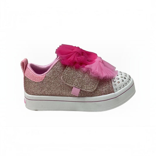 The Shoe Shop Twinkle Toes Twi-Lites 2.0 sneaker with pink glitter, rhinestone toe cap, and tulle bow detail.