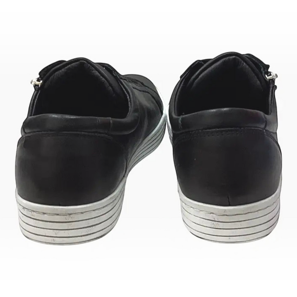 The Shoe Shop Cabello Unity black leather sneakers showing the back view with white thermo soles.