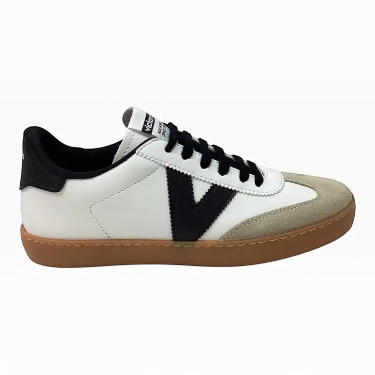 The Shoe Shop Victoria Berlin sneaker in white leather with beige suede toe, black V logo, and gum rubber sole.