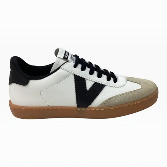 The Shoe Shop Victoria Berlin sneaker in white leather with beige suede toe, black V logo, and gum rubber sole.