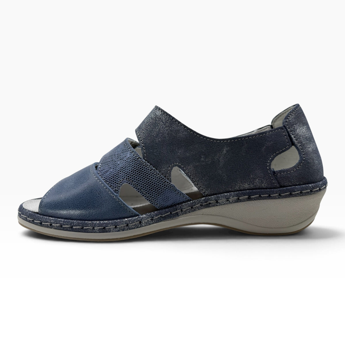 The Shoe Shop Vivi wedge sandal in navy blue leather with textured side panels and a comfortable low wedge heel