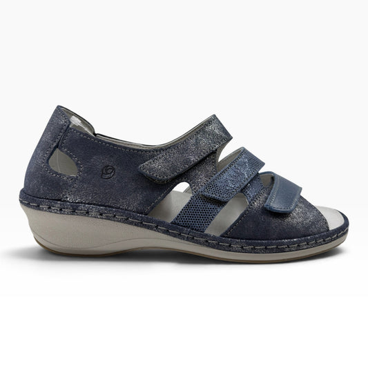 The Shoe Shop Vivi wedge sandal in metallic navy blue with adjustable velcro straps and a comfortable low wedge heel.