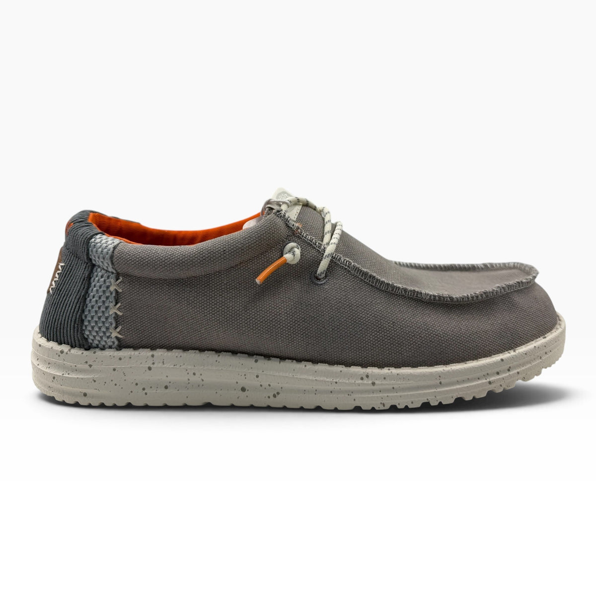 The Shoe Shop Wally grey canvas slip-on shoe with a speckled white sole and orange interior lining