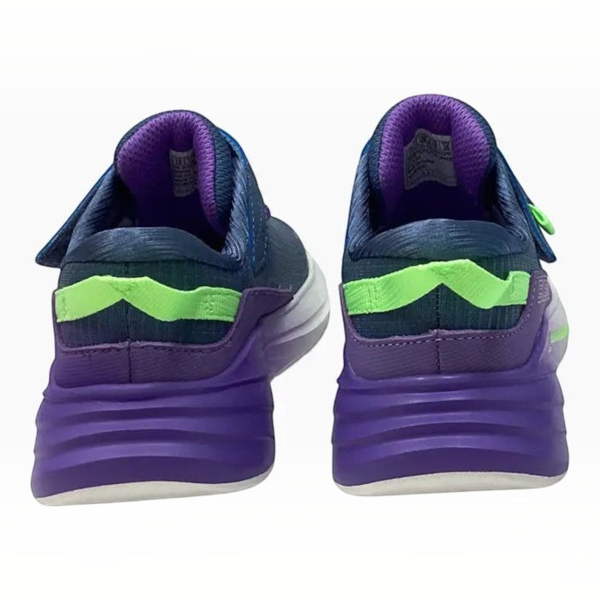 The Shoe Shop Wave 92 Imara Lite kids' sneakers in purple, blue, and lime green, showing the back view of the heels.
