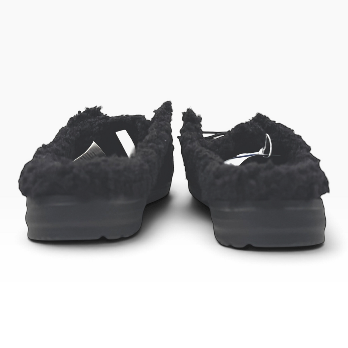 The Shoe Shop Wendy black faux fur lined slip-on slippers with a durable rubber sole