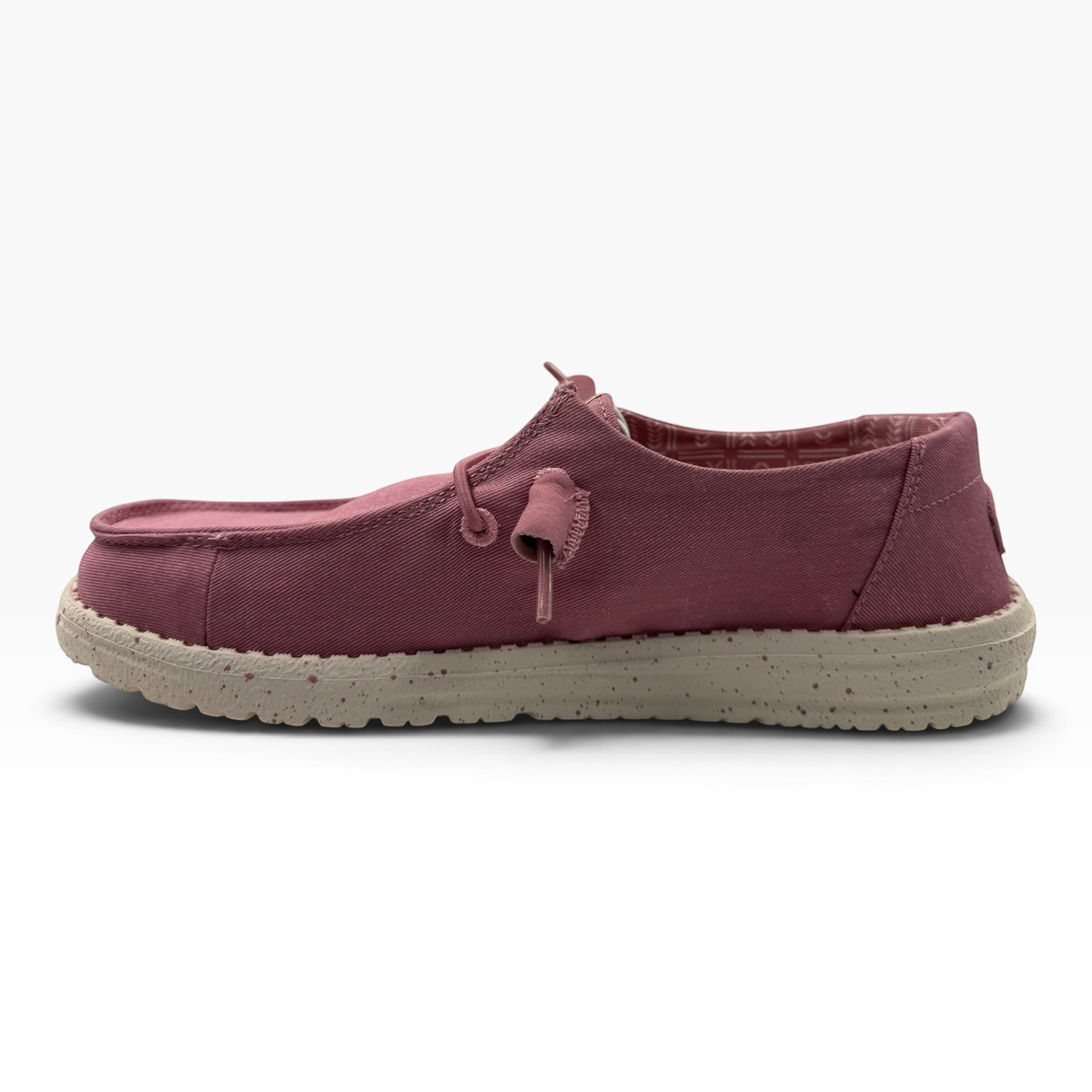 The Shoe Shop Wendy Stretch slip-on shoe in dusty rose canvas with a speckled beige rubber sole and side view