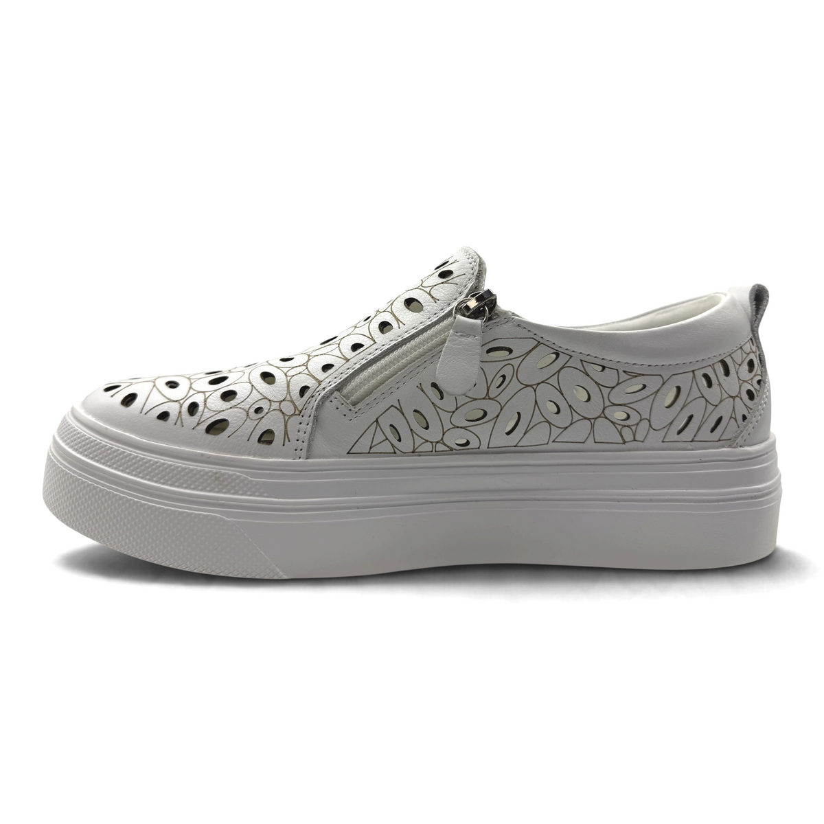 The Shoe Shop Triffic white leather sneaker with laser-cut floral patterns, side zip, and a thick platform sole.