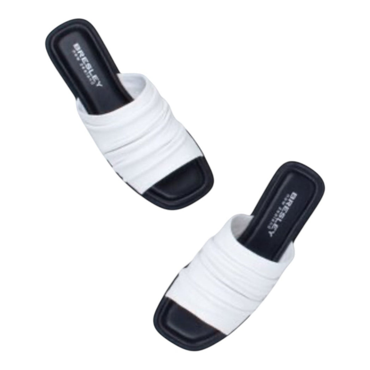 The Shoe Shop Slim white leather slides with a ruched upper and cushioned black footbed for everyday comfort.