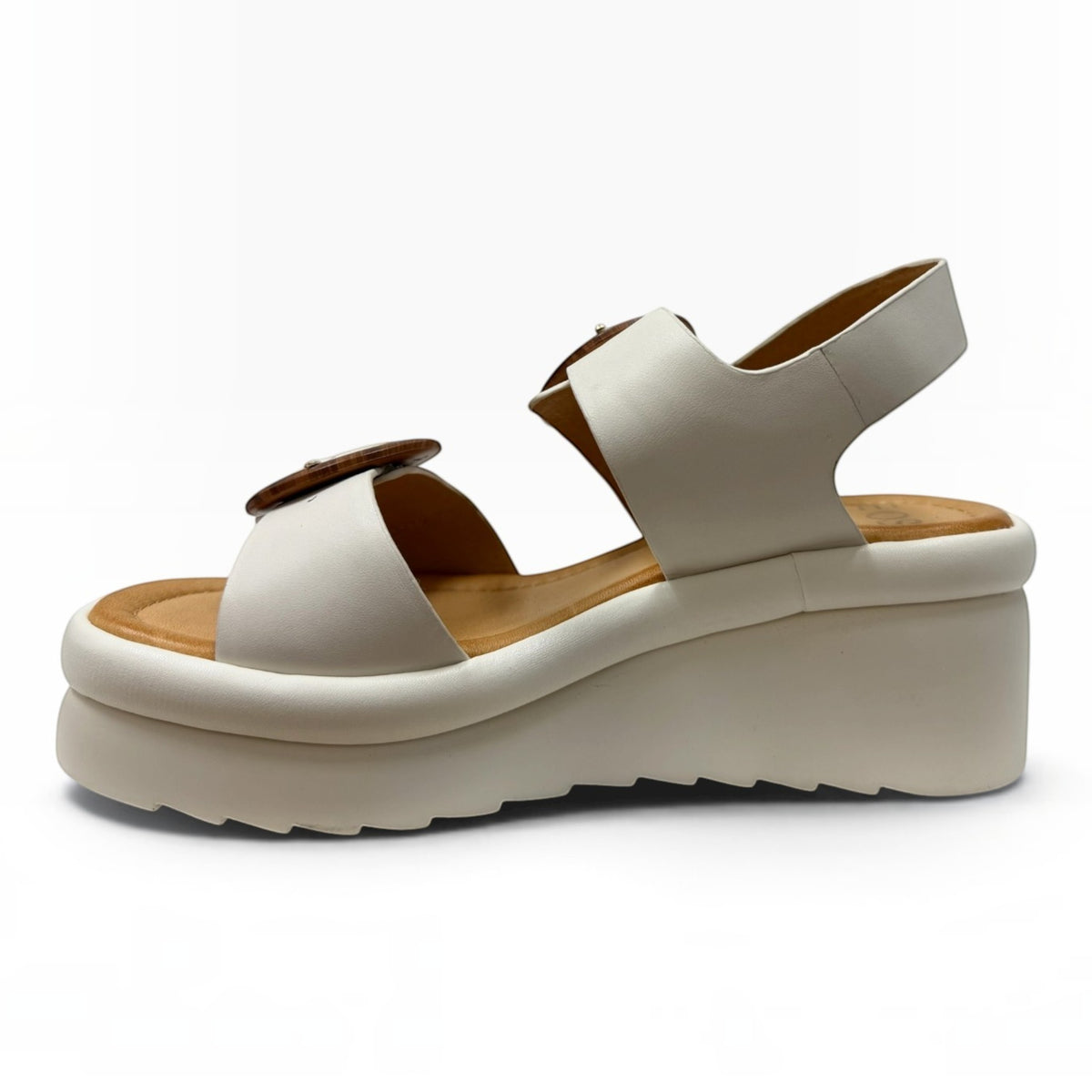 The Shoe Shop Menorcas platform sandals in white with a brown desert-toned footbed and buckle detail
