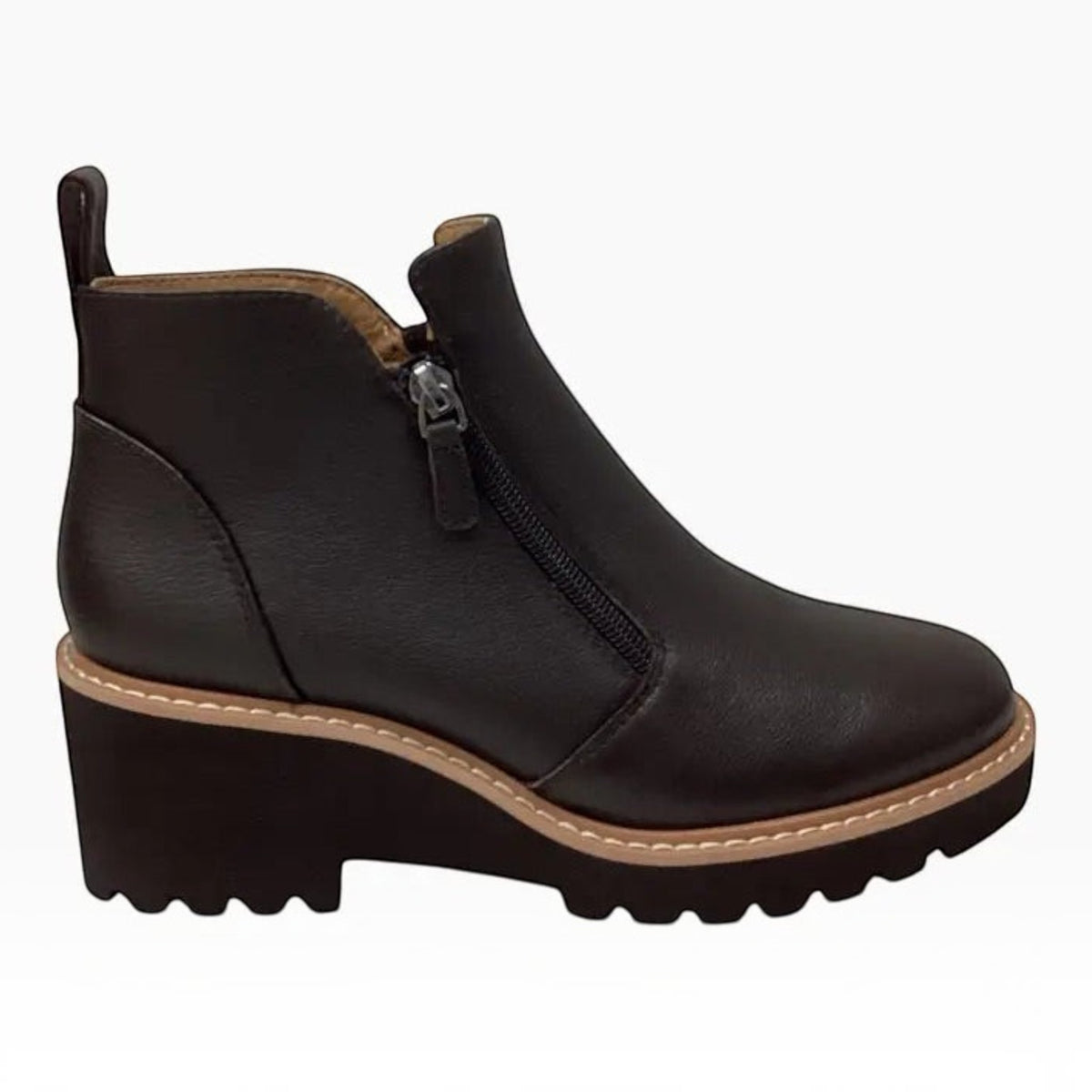 The Shoe Shop Whitney black leather ankle boot with twin side zips and a 60mm wedge heel on a lugged rubber outsole.