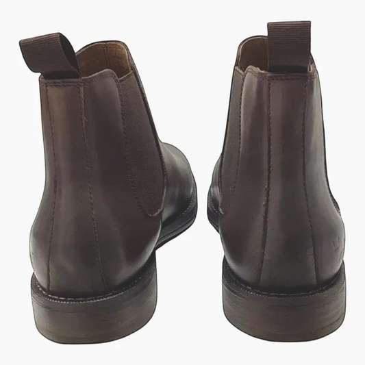 The Shoe Shop Winner brown leather Chelsea boots viewed from the back showing pull tabs and durable rubber outsoles.