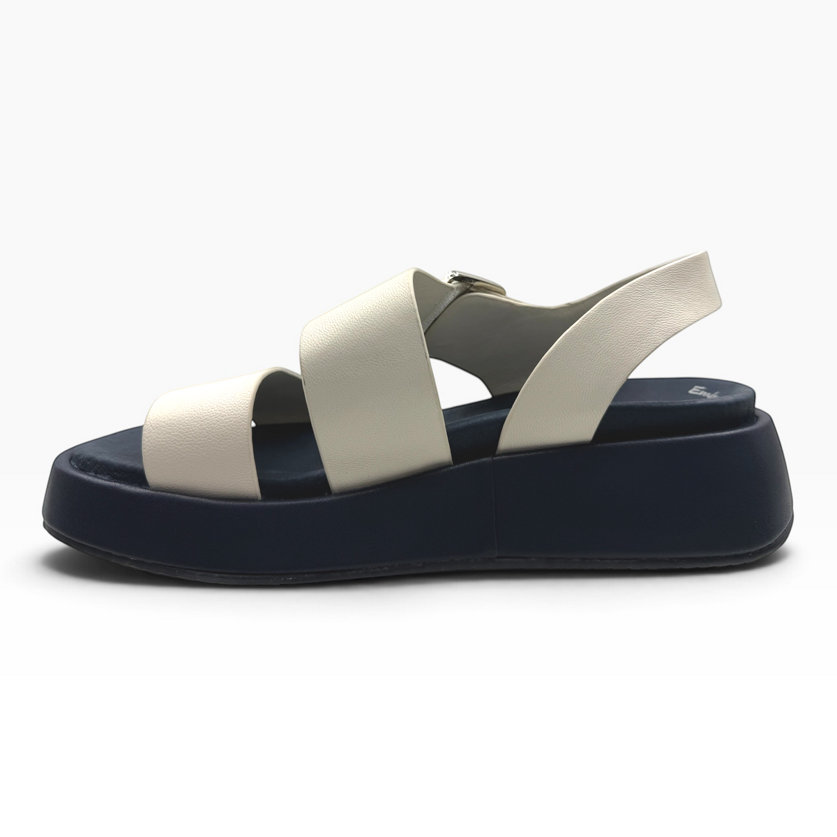 The Shoe Shop Zen platform sandals featuring cream leather straps and a contrasting navy blue chunky sole
