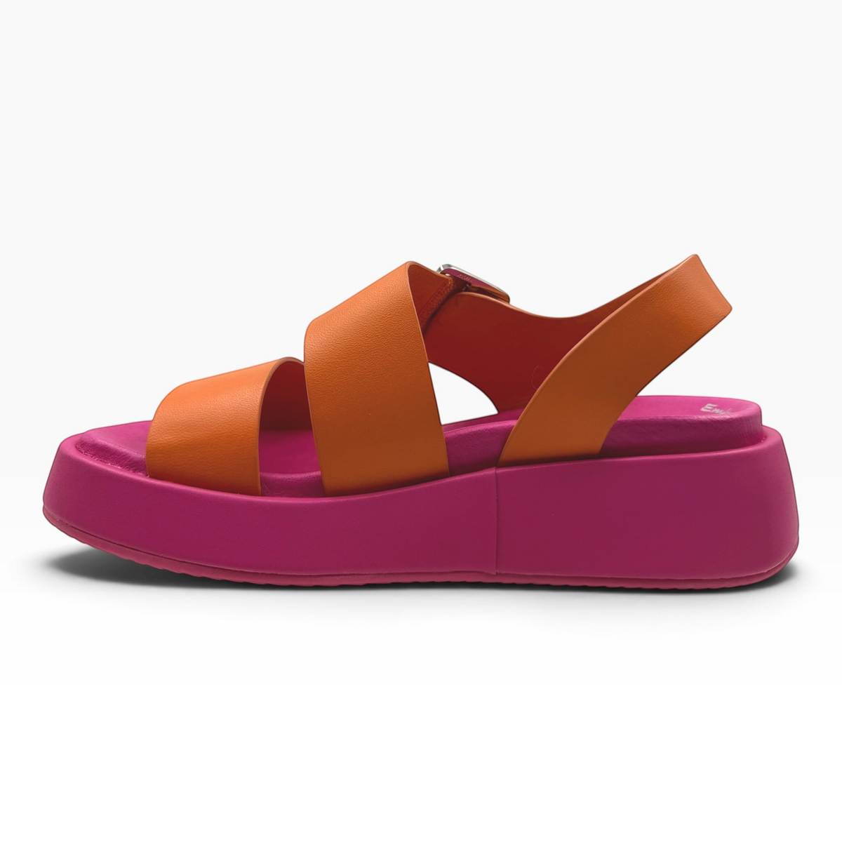 The Shoe Shop Zen platform sandals featuring orange straps and a vibrant pink chunky sole in a side profile view.