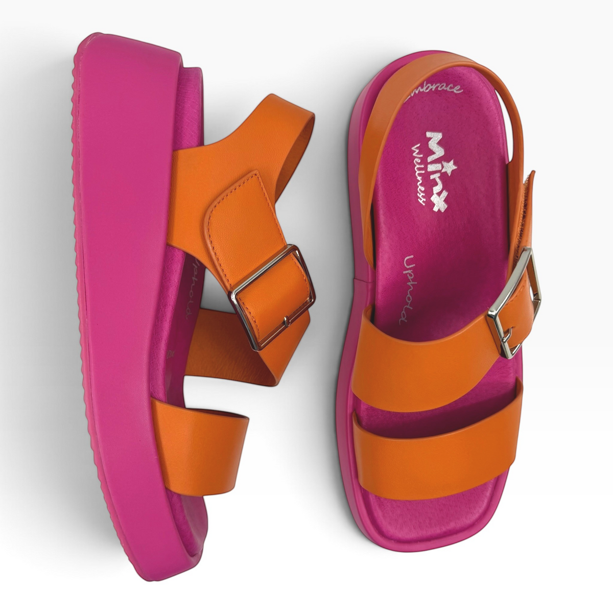 The Shoe Shop Zen platform sandals featuring vibrant orange leather straps and a contrasting bright pink sole.