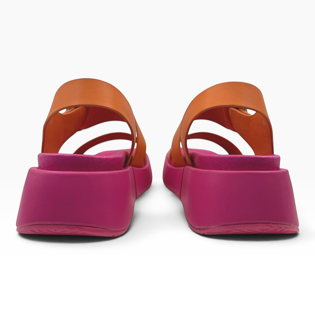 The Shoe Shop Zen platform sandals featuring tan leather straps and a vibrant pink chunky sole, rear view