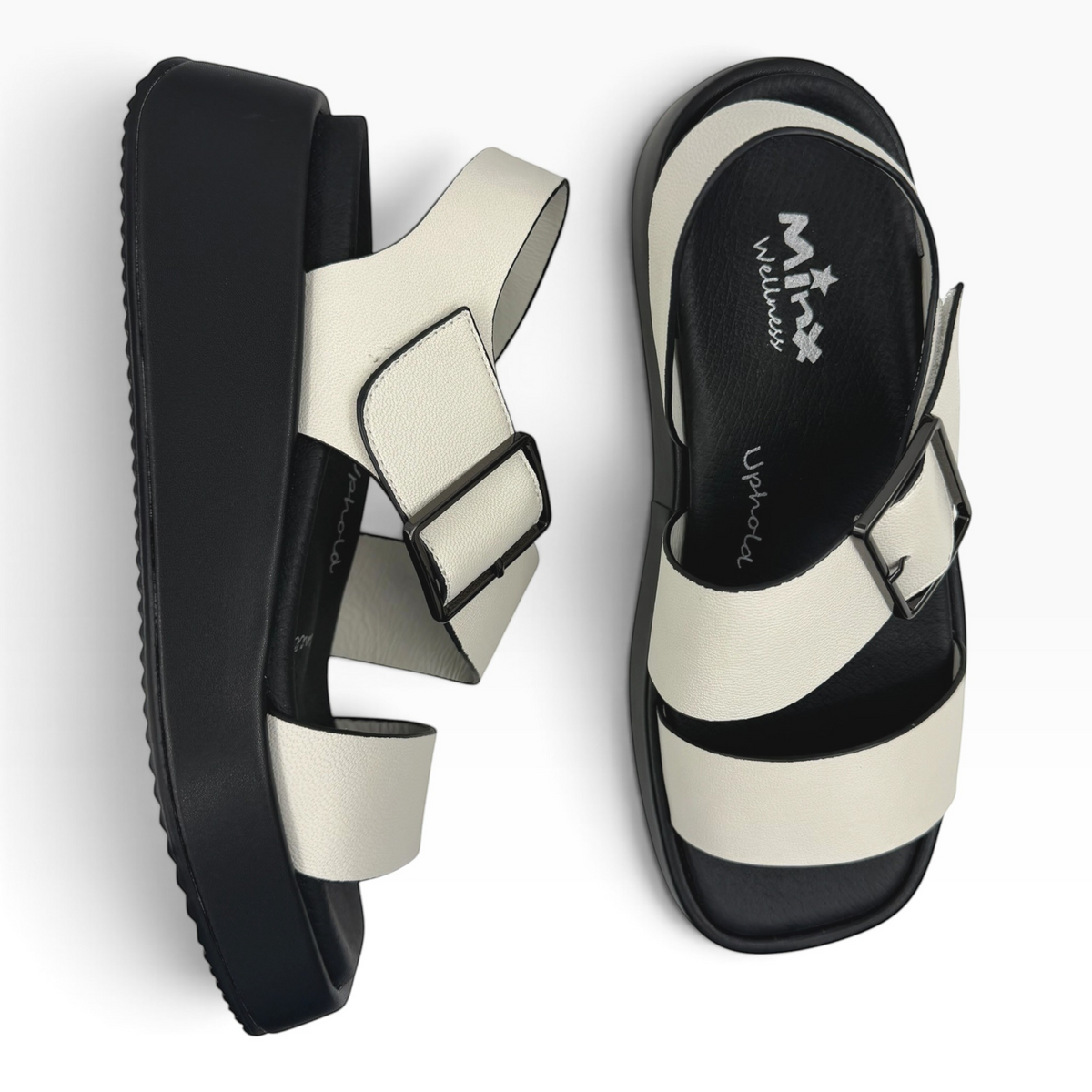 The Shoe Shop Zen platform sandals in white and black with adjustable buckle straps and comfortable footbed