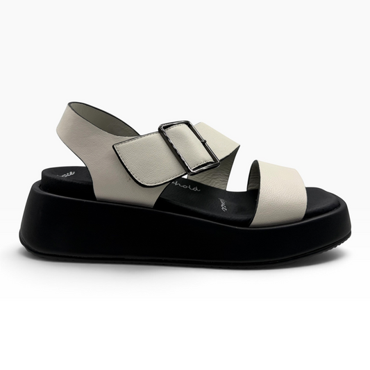 The Shoe Shop Zen platform sandals in white leather with a black chunky sole and adjustable buckle strap