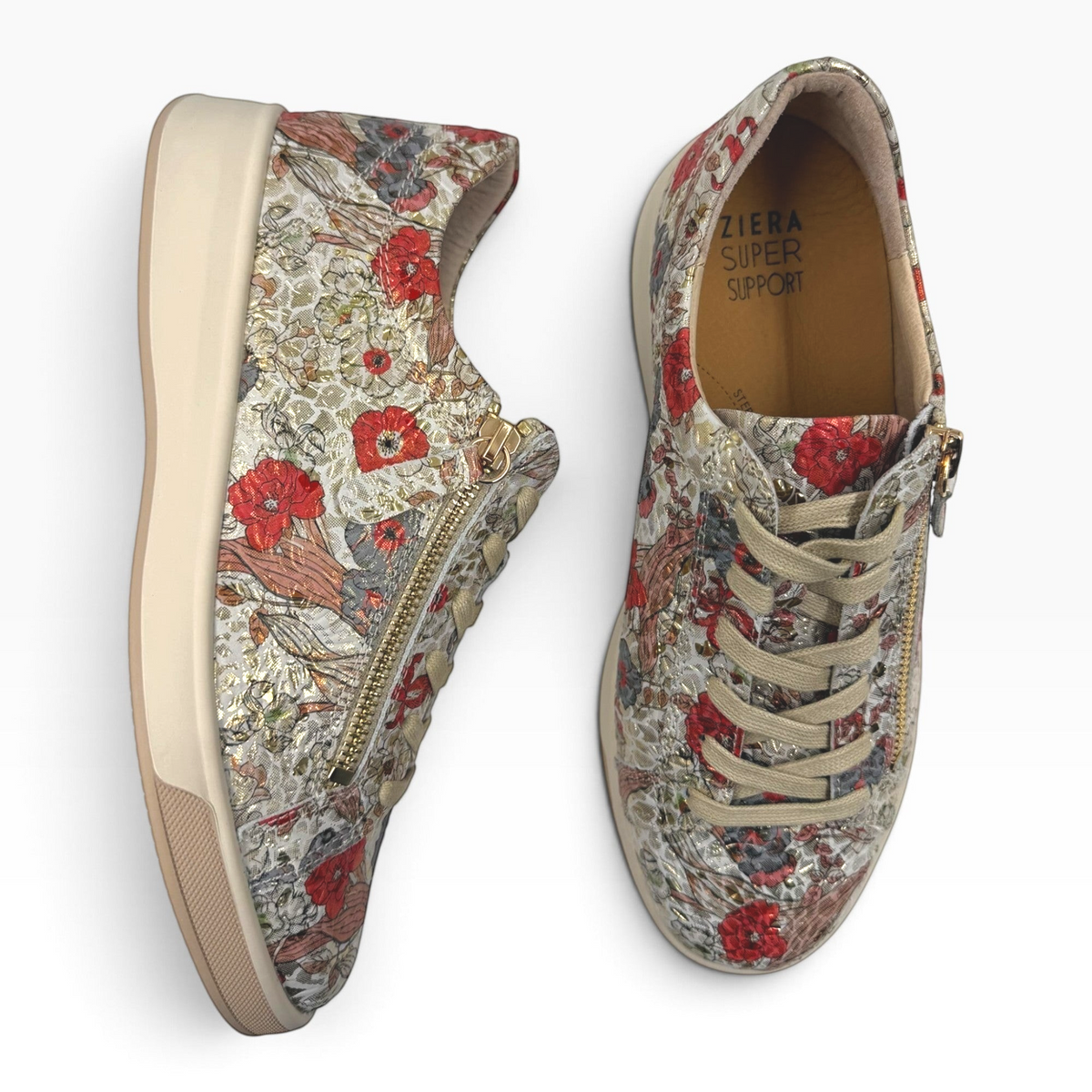 The Shoe Shop Ziera Aito sneakers in cream textured leather with a red floral print, gold side zip, and tonal laces.