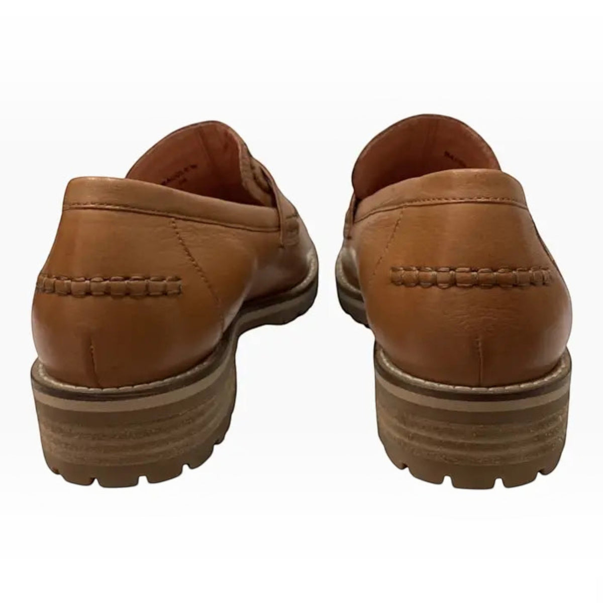 The Shoe Shop Ziera Maudle tan leather loafers featuring a chunky lug sole and stitched heel detail, rear view.
