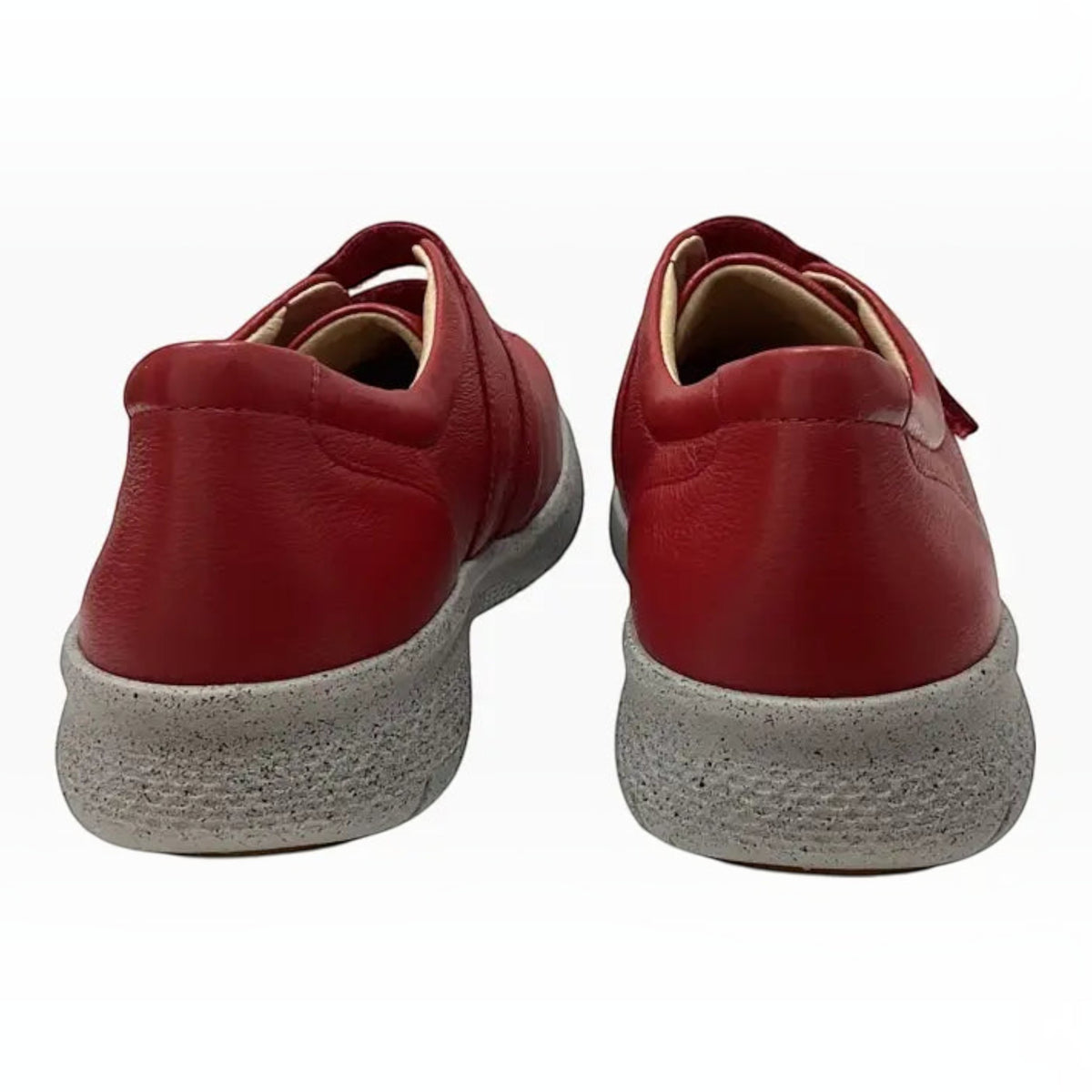 The Shoe Shop Ziera Sonnye red leather sneakers viewed from the back, showing the wide heel and speckled grey sole.